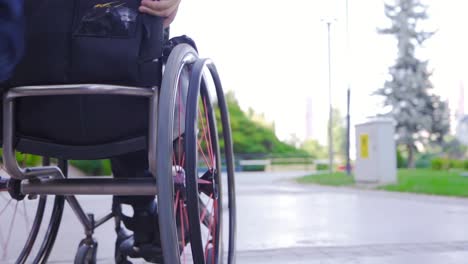 Man-in-wheelchair-moves-in-slow-motion.